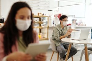 students in higher education class wearing masks