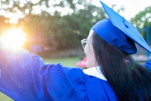 college graduate celebrating
